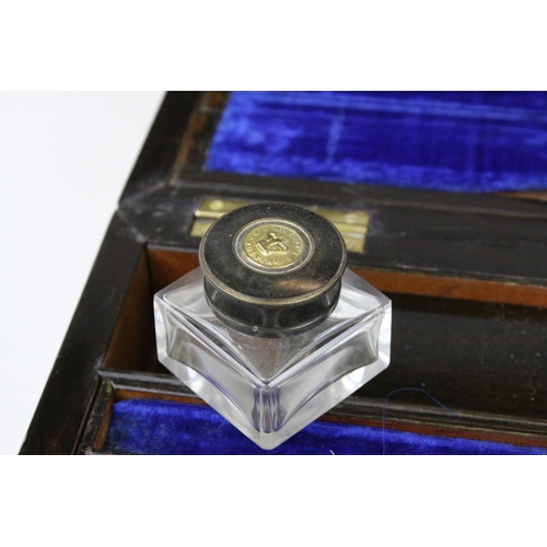 74 - Mid to Late 19th century Domed Top Walnut Writing Box with Ornate Brass Banding, the fitted interior... 