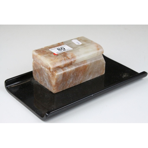 80 - Art Deco Bakelite and Marble Desk Stand, the hinged lid opening to reveal two inkwells, 24cms long