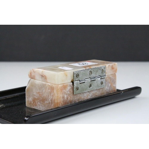 80 - Art Deco Bakelite and Marble Desk Stand, the hinged lid opening to reveal two inkwells, 24cms long
