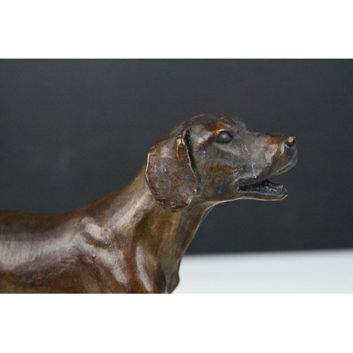 85 - Two bronze sculptured hunting hounds/dogs