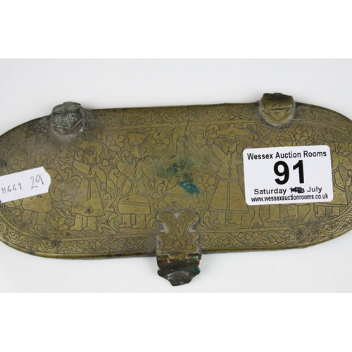 91 - Persian Brass Oval Box, the lid opening to reveal a interior panel covering a fitted interior, possi... 