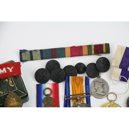 44 - A Full Size British World War One Medal Trio To Include The Victory Medal, The British War Medal And