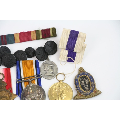 44 - A Full Size British World War One Medal Trio To Include The Victory Medal, The British War Medal And