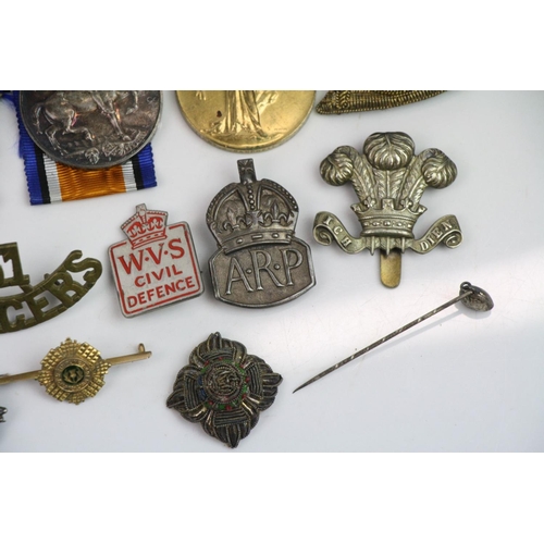 44 - A Full Size British World War One Medal Trio To Include The Victory Medal, The British War Medal And
