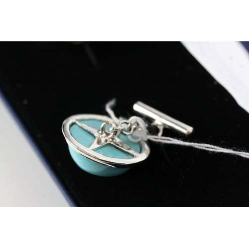 241 - A pair of silver and turquoise set cufflinks