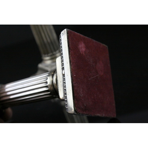 87 - Pair of Silver Plated Corinthian Column Candlesticks, h.17cms