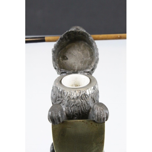 93 - 19th century Pewter Inkwell and Quill Holder in the form of a Lion sitting on his back legs and hold... 