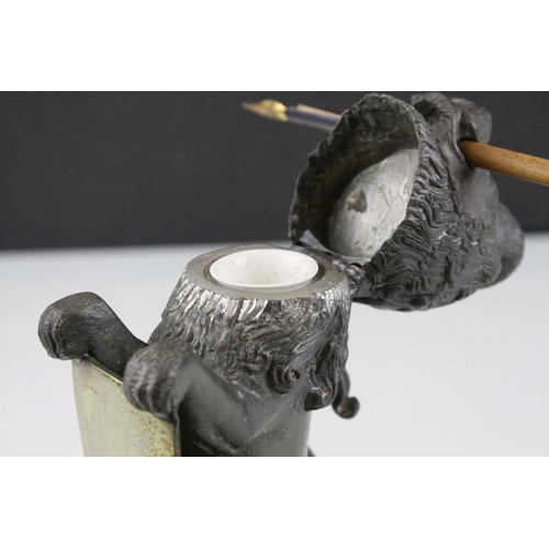 93 - 19th century Pewter Inkwell and Quill Holder in the form of a Lion sitting on his back legs and hold... 