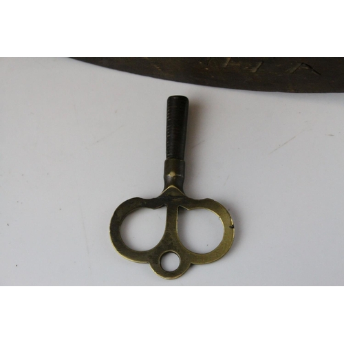 100 - 19th century Wall Clock contained in an Octagonal Brass Inlaid Fruitwood Case, the white enamel face... 