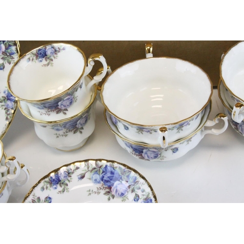 107 - Royal Albert ' Moonlight Rose ' Service including Teapot, 2 milk jugs, oval serving plate, 8 dinner ... 