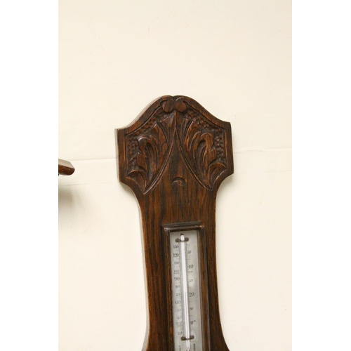 113 - An oak cased mid century banjo barometer.