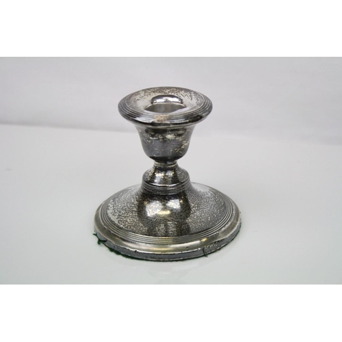 262 - A fully hallmarked sterling silver candlestick with a Birmingham assay mark.