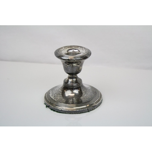 262 - A fully hallmarked sterling silver candlestick with a Birmingham assay mark.