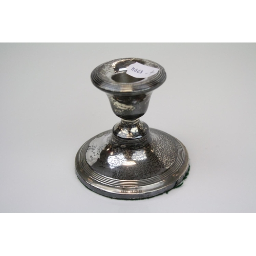 262 - A fully hallmarked sterling silver candlestick with a Birmingham assay mark.