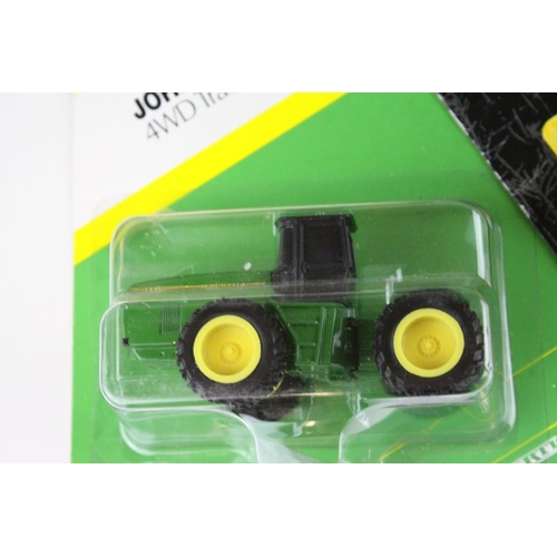 68 - Four Ertl Diecast John Deere Agricultural Tractors - 9400 4WD Tractor, 9400T Tractor and Two 4WD Tra... 