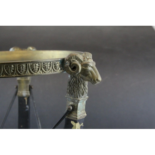 88 - Empire Style Wrought Iron and Brass Stand with Rams Head Mounts, h.38cms