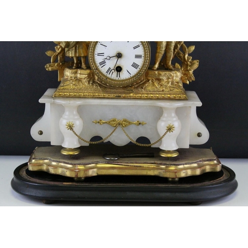 99 - 19th century Continental Ornate Gilt Metal Figural Mantle Clock raised on a White Onyx Base and cont... 