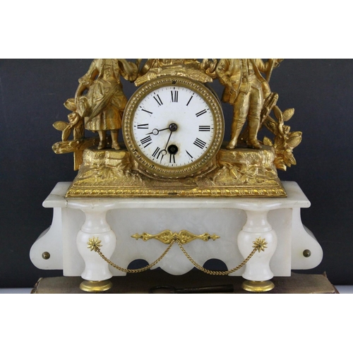 99 - 19th century Continental Ornate Gilt Metal Figural Mantle Clock raised on a White Onyx Base and cont... 