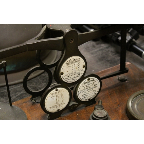 103 - Victorian Oak Postal Scales by Houghton & Sons, London with Weights, 42cms wide