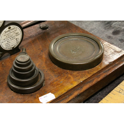 103 - Victorian Oak Postal Scales by Houghton & Sons, London with Weights, 42cms wide