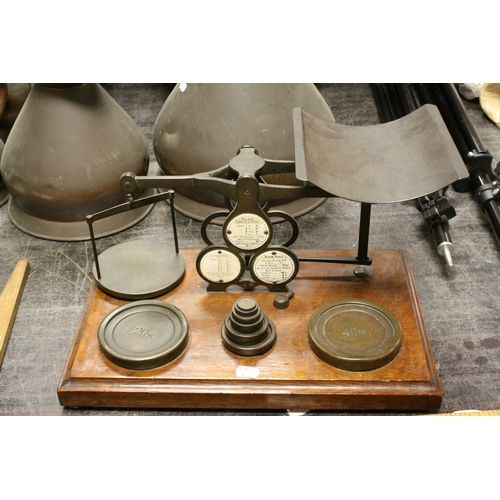 103 - Victorian Oak Postal Scales by Houghton & Sons, London with Weights, 42cms wide