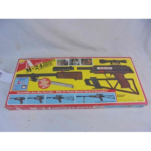 2024 - Boxed Arco 197 The A Team M-24 Assault Rifle Target Game Set, near complete missing only two darts, ... 
