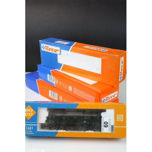 60 - Four boxed ROCO HO gauge locomotives to include International 4130 E1445 DB, 43457 DB BR290, 63640 D... 