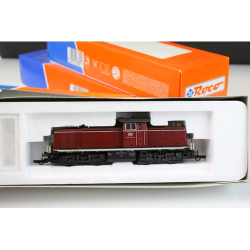 60 - Four boxed ROCO HO gauge locomotives to include International 4130 E1445 DB, 43457 DB BR290, 63640 D... 