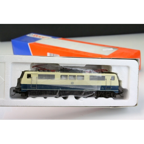 60 - Four boxed ROCO HO gauge locomotives to include International 4130 E1445 DB, 43457 DB BR290, 63640 D... 