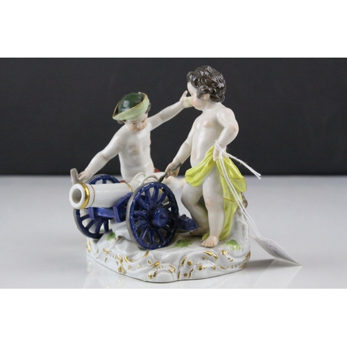 18 - Meissen Porcelain Figure Group of Two Children / Infants firing a Cannon, the base decorated with gi... 