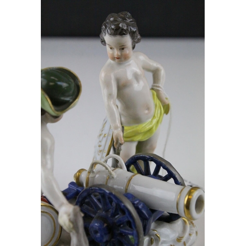 18 - Meissen Porcelain Figure Group of Two Children / Infants firing a Cannon, the base decorated with gi... 