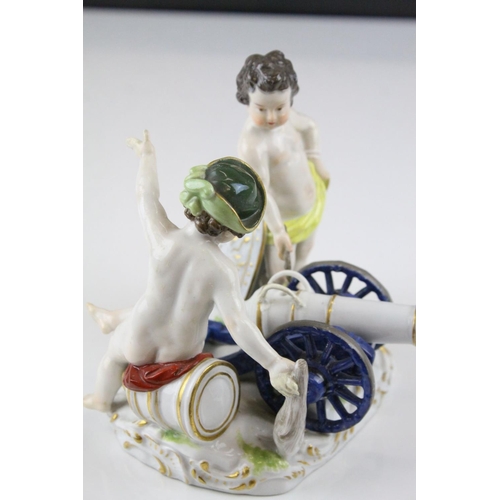18 - Meissen Porcelain Figure Group of Two Children / Infants firing a Cannon, the base decorated with gi... 