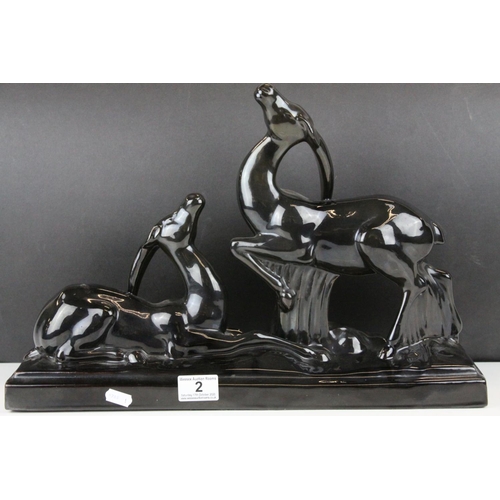 2 - In the manner of Charles Lemanceau for St. Clement, Art Deco Black Glazed Ceramic Antelopes, 46cms l... 