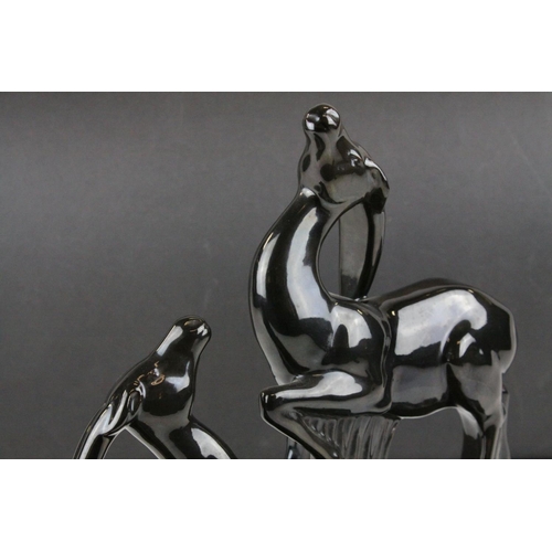 2 - In the manner of Charles Lemanceau for St. Clement, Art Deco Black Glazed Ceramic Antelopes, 46cms l... 