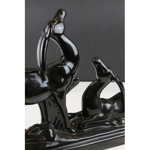 2 - In the manner of Charles Lemanceau for St. Clement, Art Deco Black Glazed Ceramic Antelopes, 46cms l... 