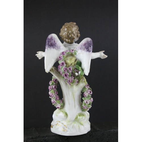 20 - Meissen Porcelain Figure of Cupid with open arms, the base decorated with gilt scrolls, blue cross s... 