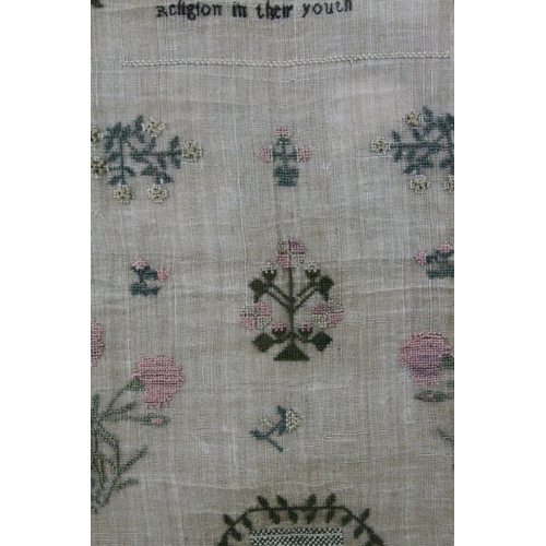 34 - George III 18th century Needlework Sampler with alphabet, verse, flowers and arch, completed by Mary... 