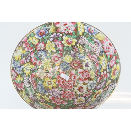 4 - Chinese Millefleur Bowl decorated throughout with the thousand flower design in famille rose enamels... 