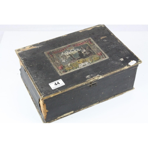 44 - Late 19th / Early 20th century German E.P. Paraffin Magic Lantern with twelve slides fitted in it's ... 
