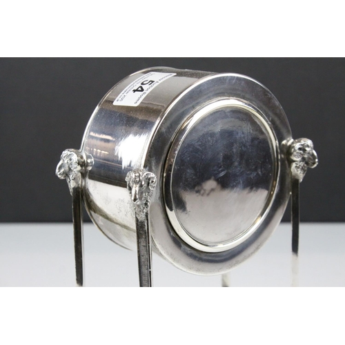 54 - French Empire Style Mantle Clock contained within a Silver Plated Case raised on square pillar suppo... 