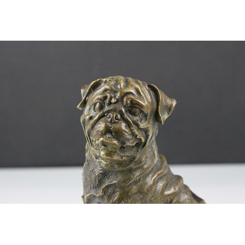 59 - A bronze seated Mastiff  dog figure 18 cm tall.