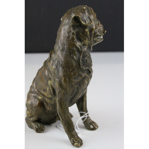 59 - A bronze seated Mastiff  dog figure 18 cm tall.