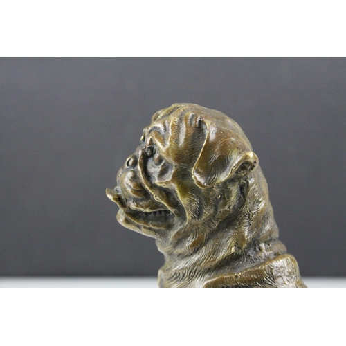 59 - A bronze seated Mastiff  dog figure 18 cm tall.