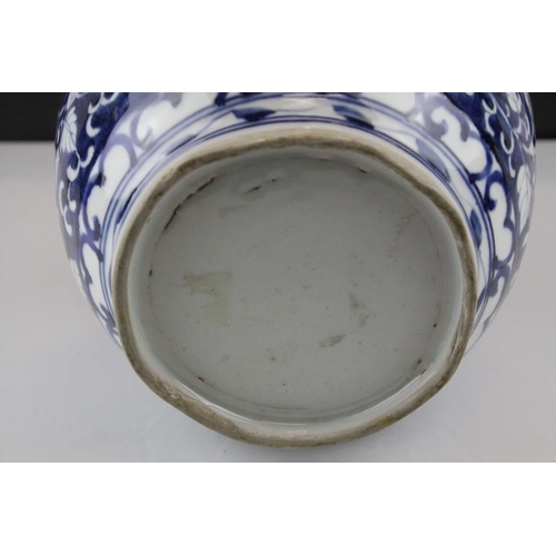 7 - Chinese Vase, the blue ground with flower decoration, 25cms high