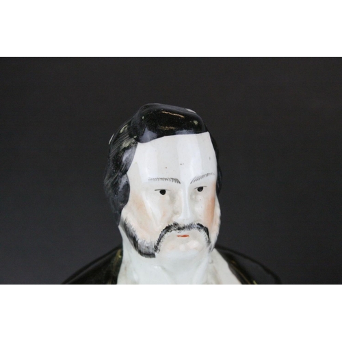 8 - Three 19th century Staffordshire Figures of Sankey, Moody and General Gordon, 42cms high together wi... 
