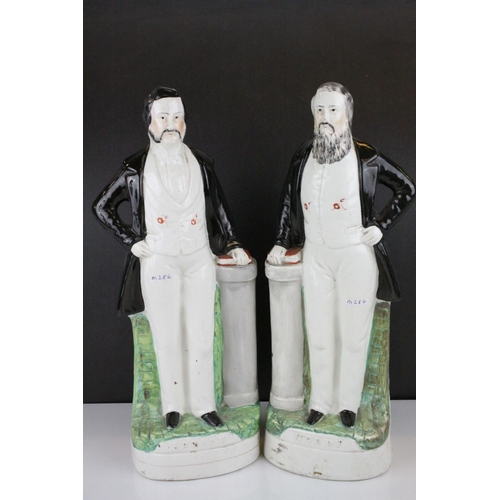 8 - Three 19th century Staffordshire Figures of Sankey, Moody and General Gordon, 42cms high together wi... 
