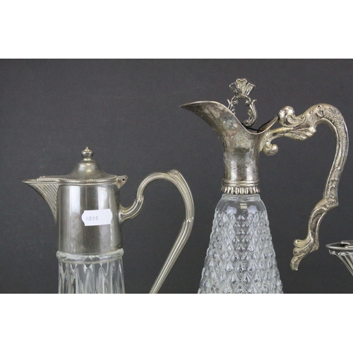 103 - Three Glass and Silver Plate Claret Jugs, Two Glass Beer Steins with Pewter Legs and a Ceramic Slop ... 