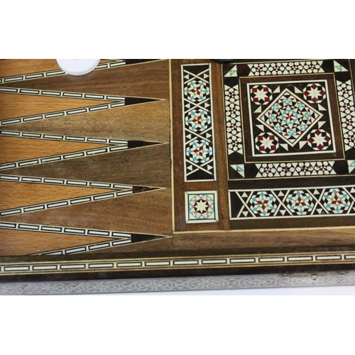 110 - Two Wooden Games Boxes inlaid with bone and mother of pearl, each containing draughts pieces and dic... 