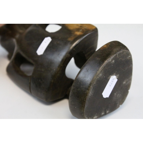 111 - African Tribal Carved Hardwood Figure of a Pensive Looking Male, 25cms high