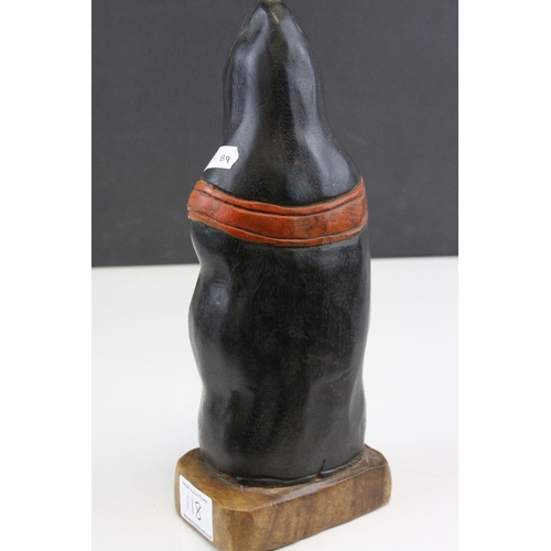 118 - Carved Wooden Figure of a Masked Person wearing a Hood Cape, possibly South American, 29cms high